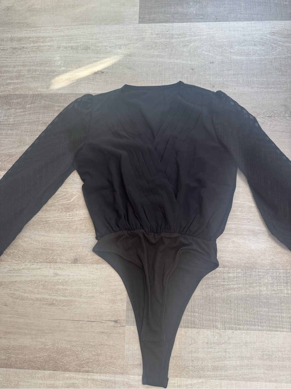 Black Long-Sleeve women's One-Piece Bodysuit size small